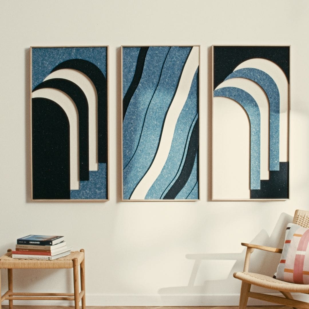 Set of three modern acoustic art panels made from upcycled Danish Royal Guard uniforms in blue tones.